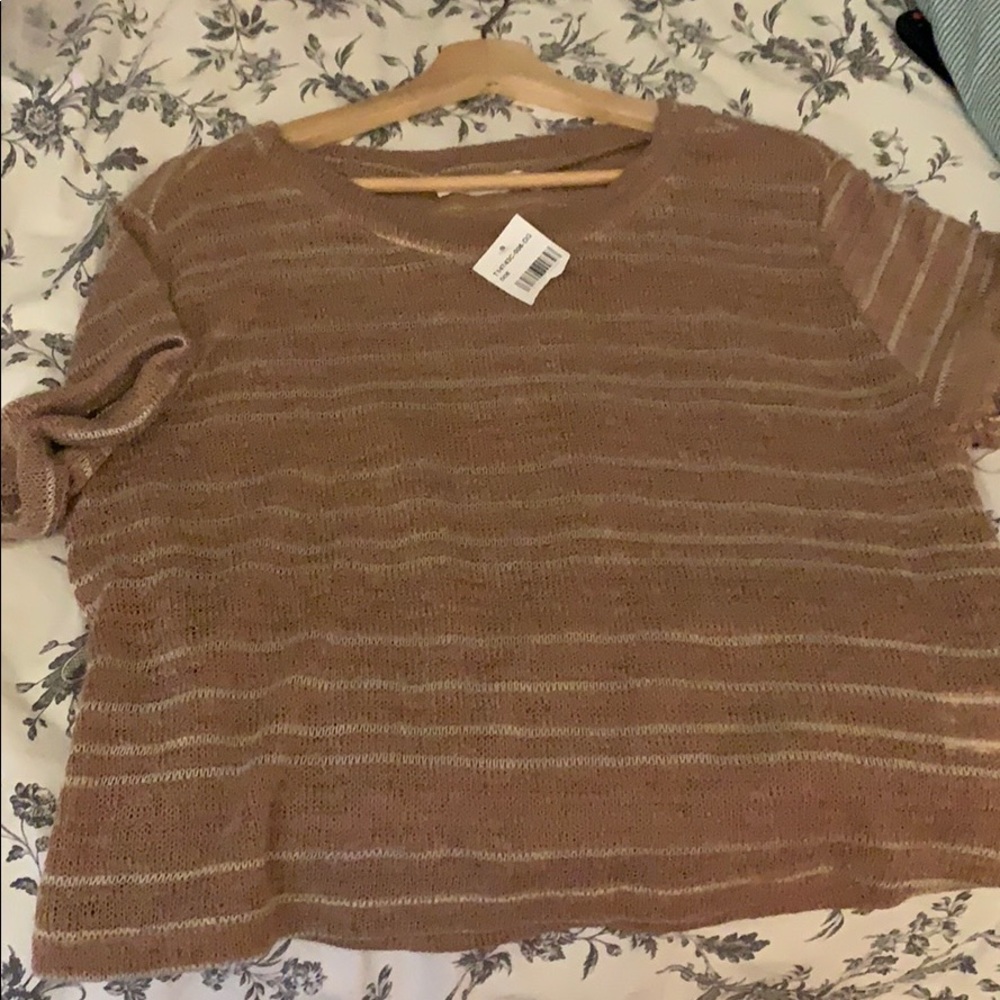 Knitted blouse.